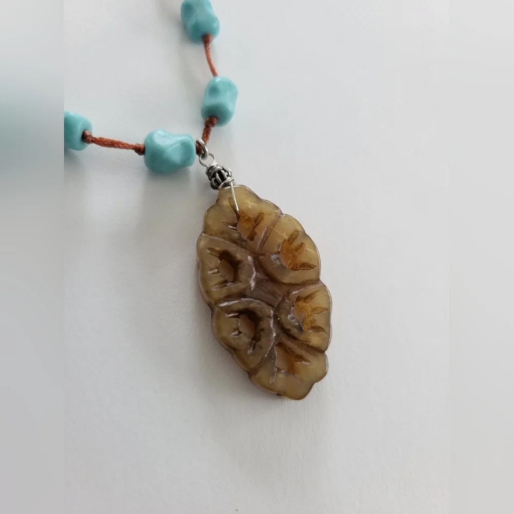 Necklace featuring turquoise nugget beads wth silver clasp. - Picture 3 of 7